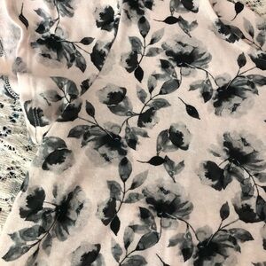 Black and cream colored shirt